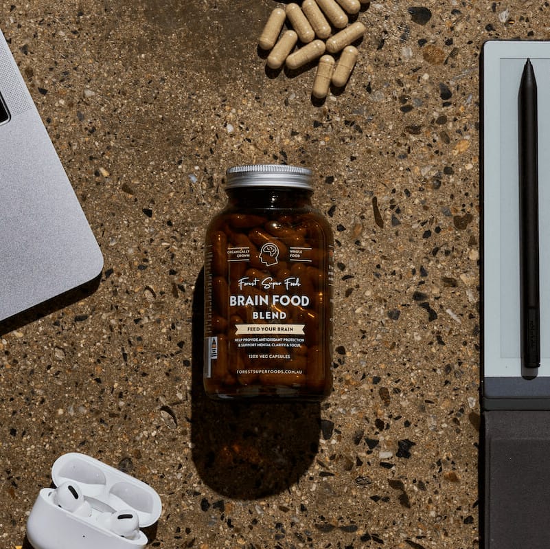 Brain Food bottle with 120 organic capsules featuring Lion’s Mane, Ginkgo, and Ginseng for cognitive health