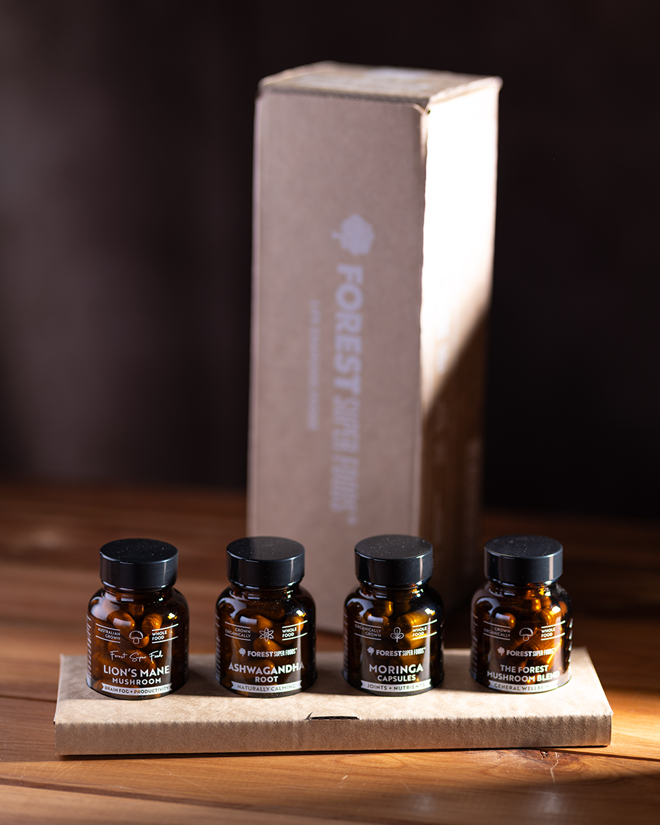 Bestseller Mini Set featuring four mini bottles of ashwagandha, lion's mane, moringa, and mushroom blends in a custom box
